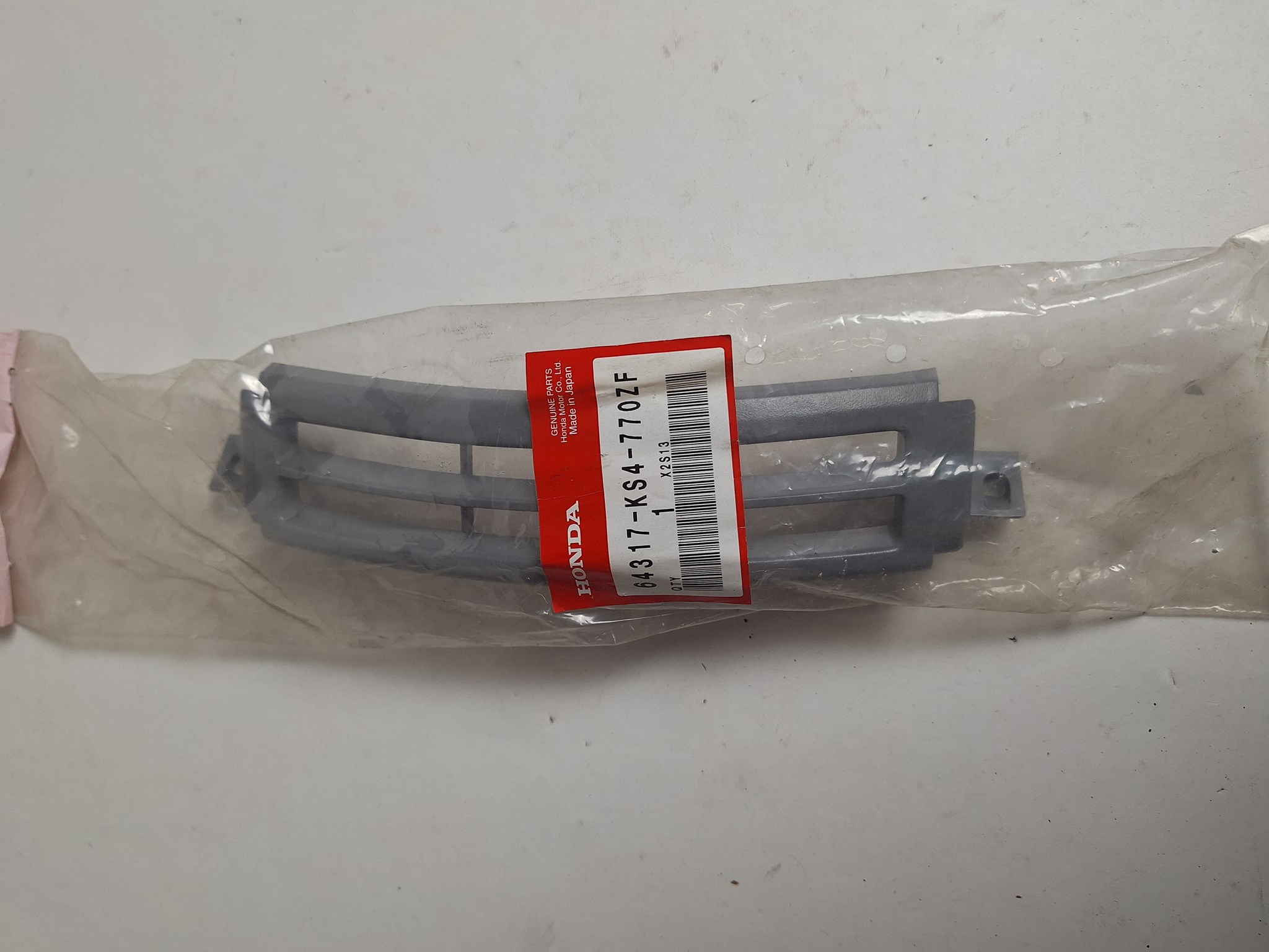 Bild von PLUG,LEG SHIELD  64317-KS4-770ZF  CN 250